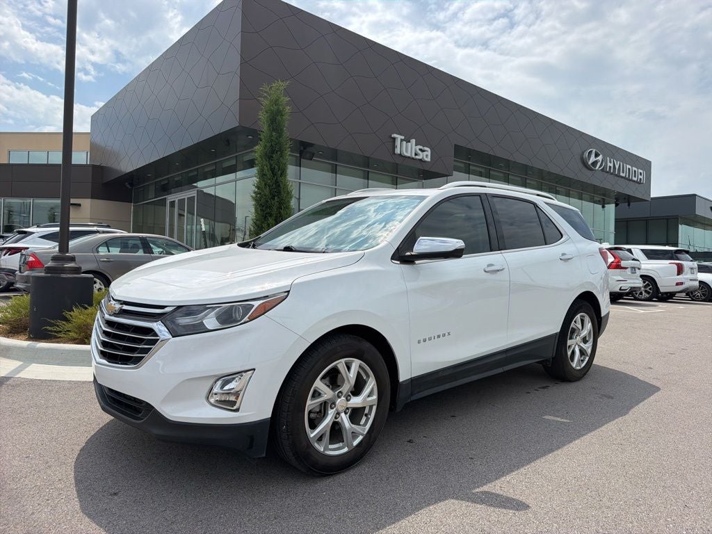2021 Chevrolet Equinox Premier in Summit White — front three-quarter view
