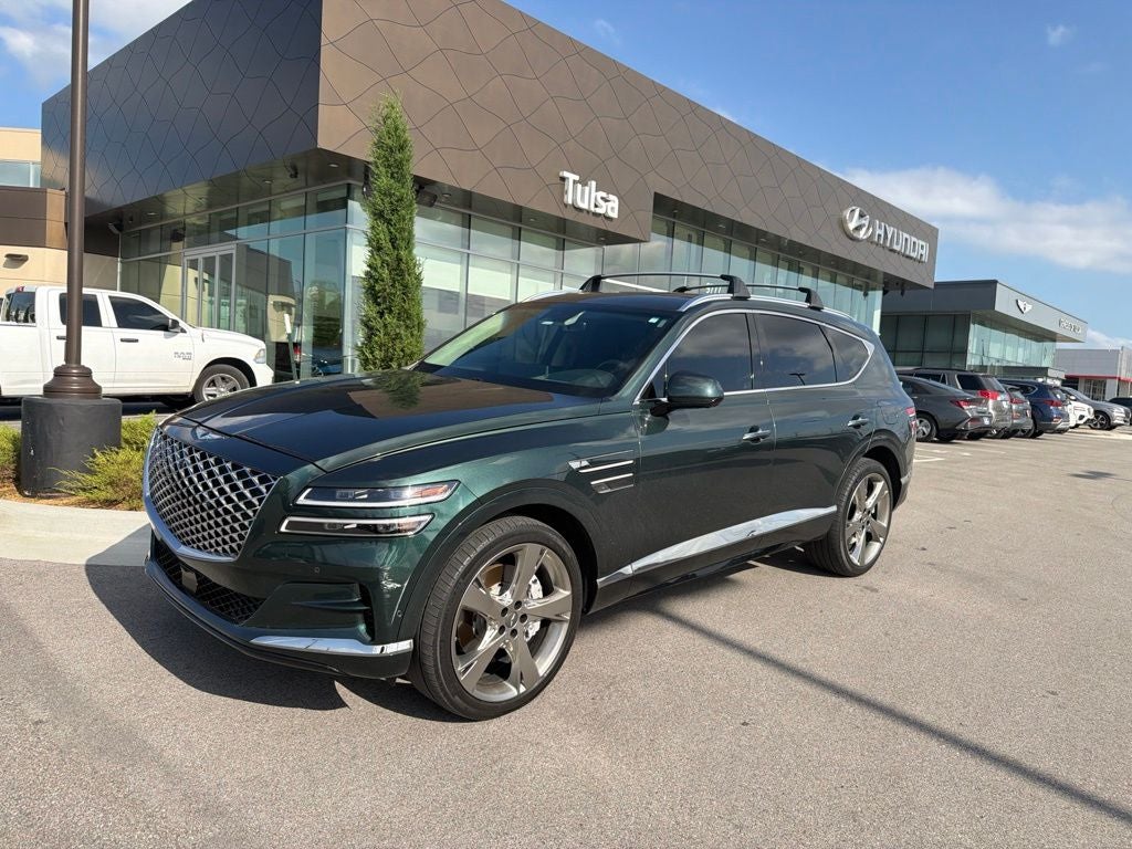 2023 Genesis GV80 3.5T in Cardiff Green — front three-quarter view